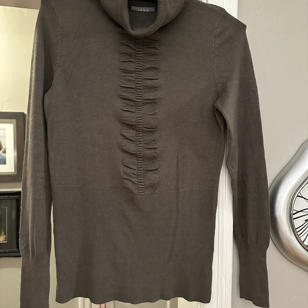 Turtleneck with Ruching Detail. European inspired styling. High quality knit.